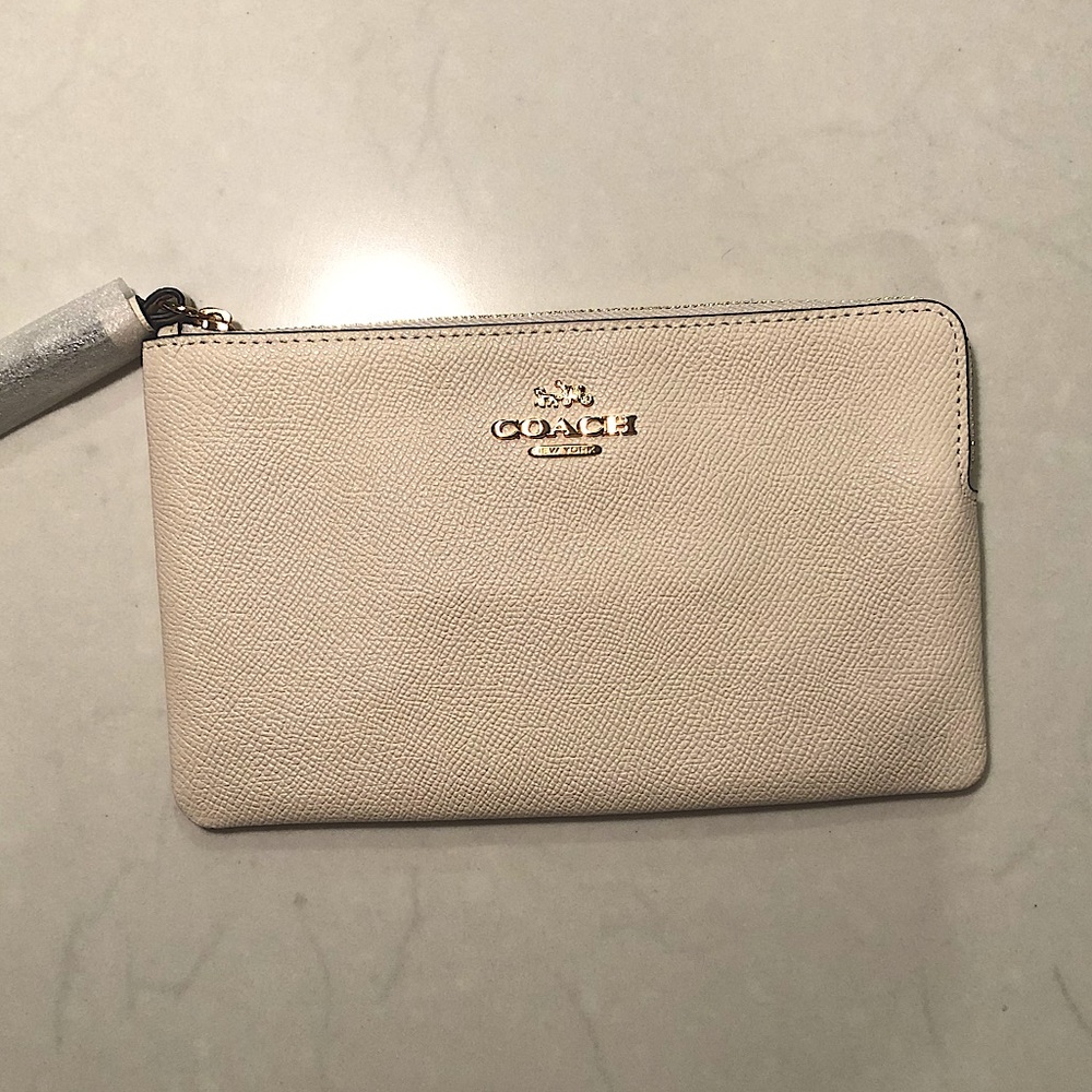 Coach cream leather wristlet/pouch